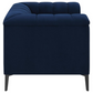 Sillón capitoné con brazos tipo smoking tapizado en color azul 509213 